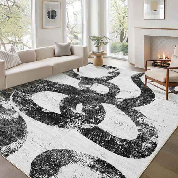 Black and White 8 ft. x 10 ft. Ultra Thin Low Pile Foldable