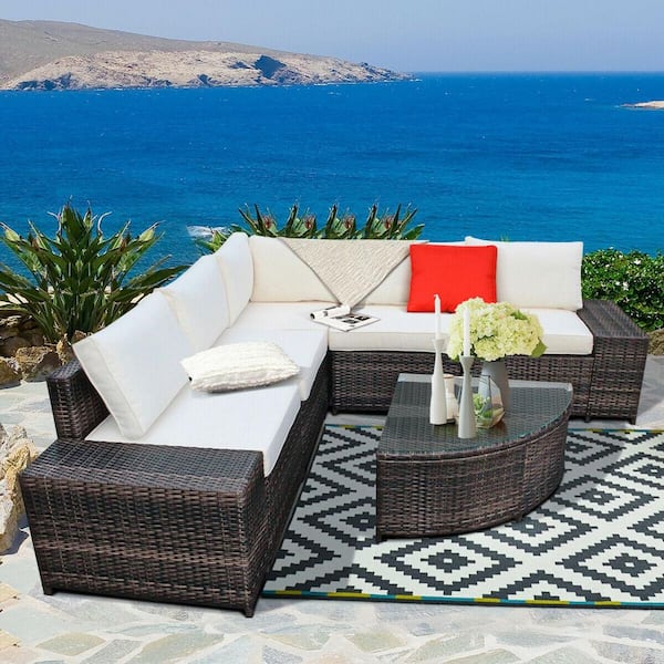 6-Piece Wicker Outdoor Sectional Set with White Cushions and Tempered Glass Coffee Table