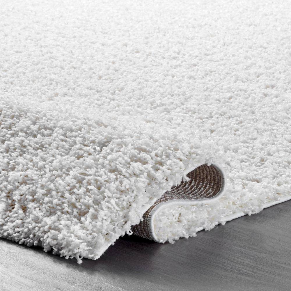 Cozy White Synthetic 8' x 10' Handmade Tufted Shag Rug