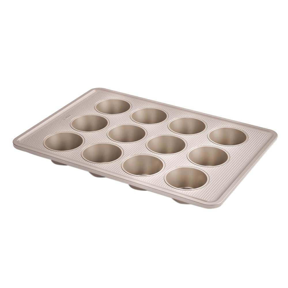 https://images.thdstatic.com/productImages/686145b8-3107-4705-b7f0-2a1d7cc3c6a4/svn/bronze-oxo-cupcake-pans-muffin-pans-11160500-64_1000.jpg