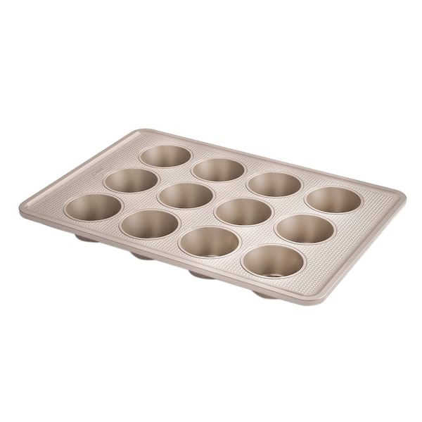https://images.thdstatic.com/productImages/686145b8-3107-4705-b7f0-2a1d7cc3c6a4/svn/bronze-oxo-cupcake-pans-muffin-pans-11160500-64_600.jpg