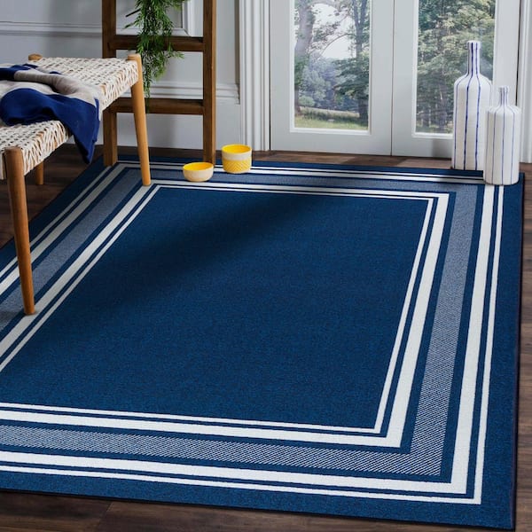 https://images.thdstatic.com/productImages/686fccea-6fe7-4eba-b79e-ef1082c4ef7a/svn/navy-beverly-rug-area-rugs-hd-crm30766-3x5-e1_600.jpg
