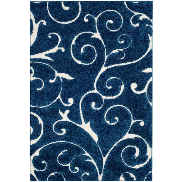 SAFAVIEH Florida Shag Dark Blue/Cream 5 ft. x 8 ft. Floral Area Rug