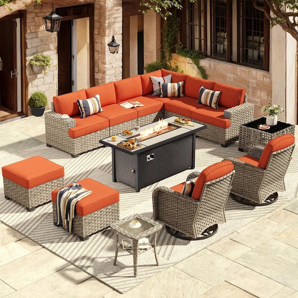 Eternity 13 Pieces Wicker Outdoor Patio Rectangular Fire Pit Set and Swivel Rocking Chairs with Orange Red Cushions
