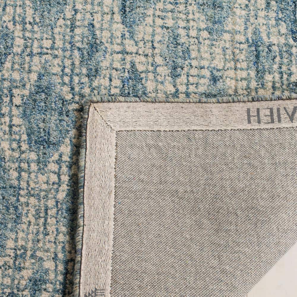 Ivory and Blue Handmade Wool Abstract Tufted Rug, 5' x 8'