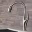 https://images.thdstatic.com/productImages/68985109-a368-41cc-82d8-34ced513cadc/svn/spot-free-stainless-steel-kraus-pull-down-kitchen-faucets-kpf-1676sfs-64_65.jpg