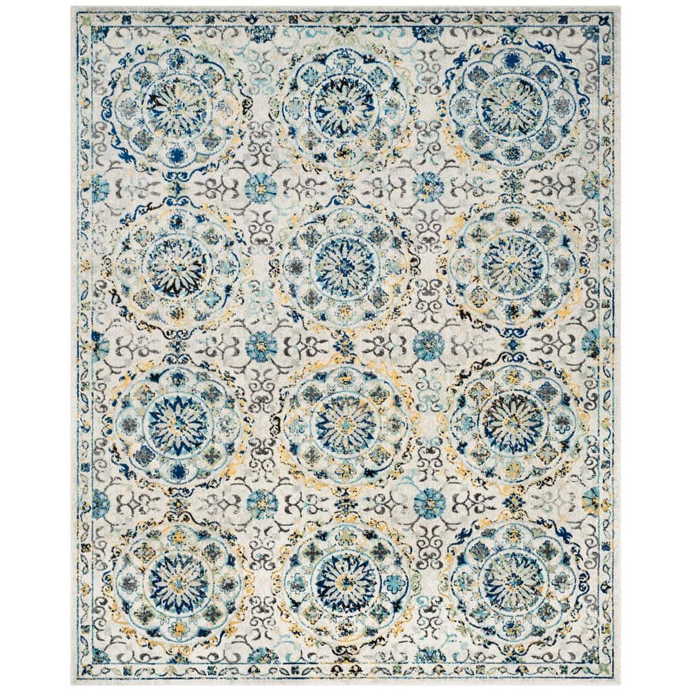 Ivory and Blue Floral Motif Synthetic Area Rug