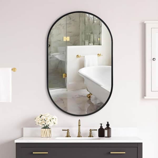 20 in. W x 32 in. H Modern Oval Metal Framed Wall Mounted Bathroom Vanity Mirror in Black