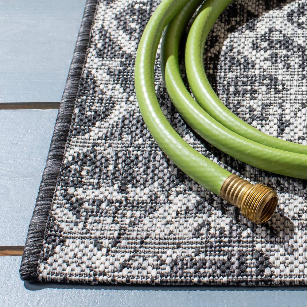 Black and Grey Geometric Indoor/Outdoor Area Rug 9' x 12'