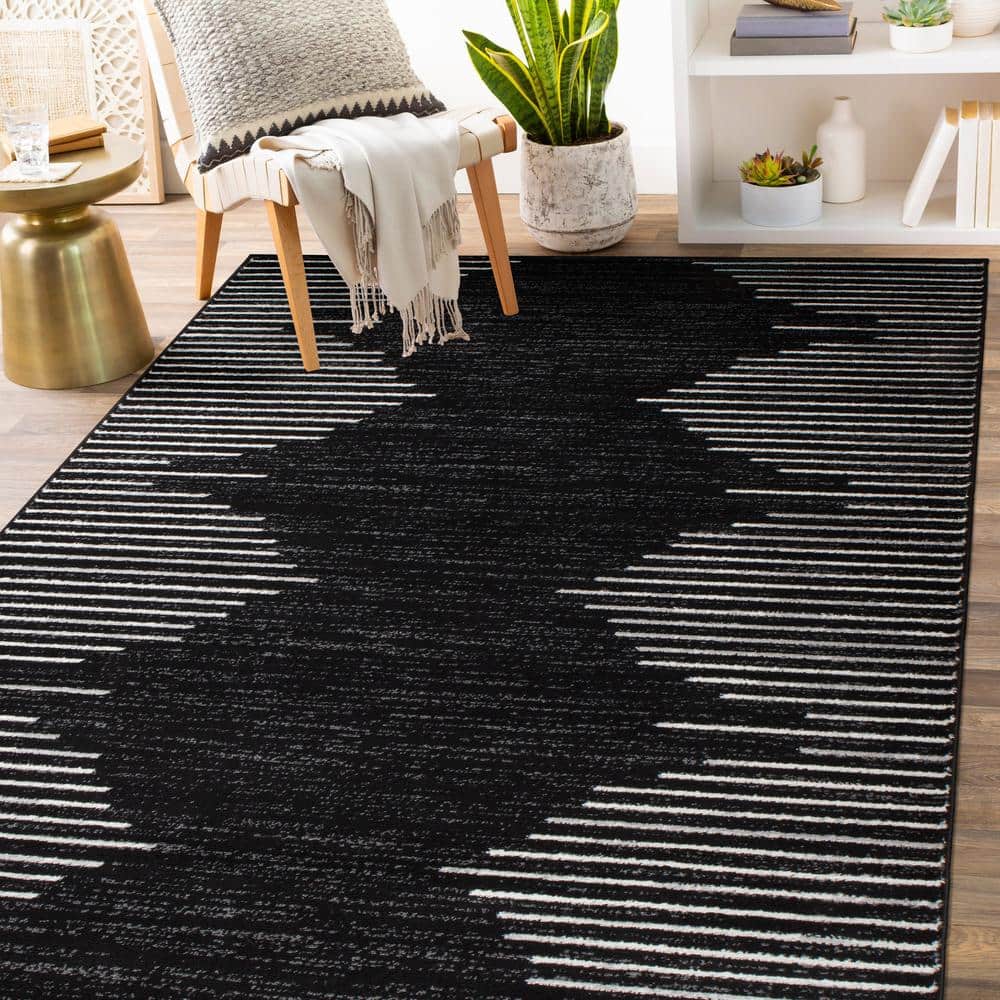 Black and White 5' x 7' Bohemian Stripe Synthetic Area Rug