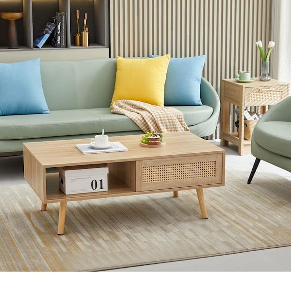 Zeus & Ruta 41.34 in. Rattan Coffee Table in Natural with Sliding Door for Storage, Solid Wood Legs, Modern Table For Living Room