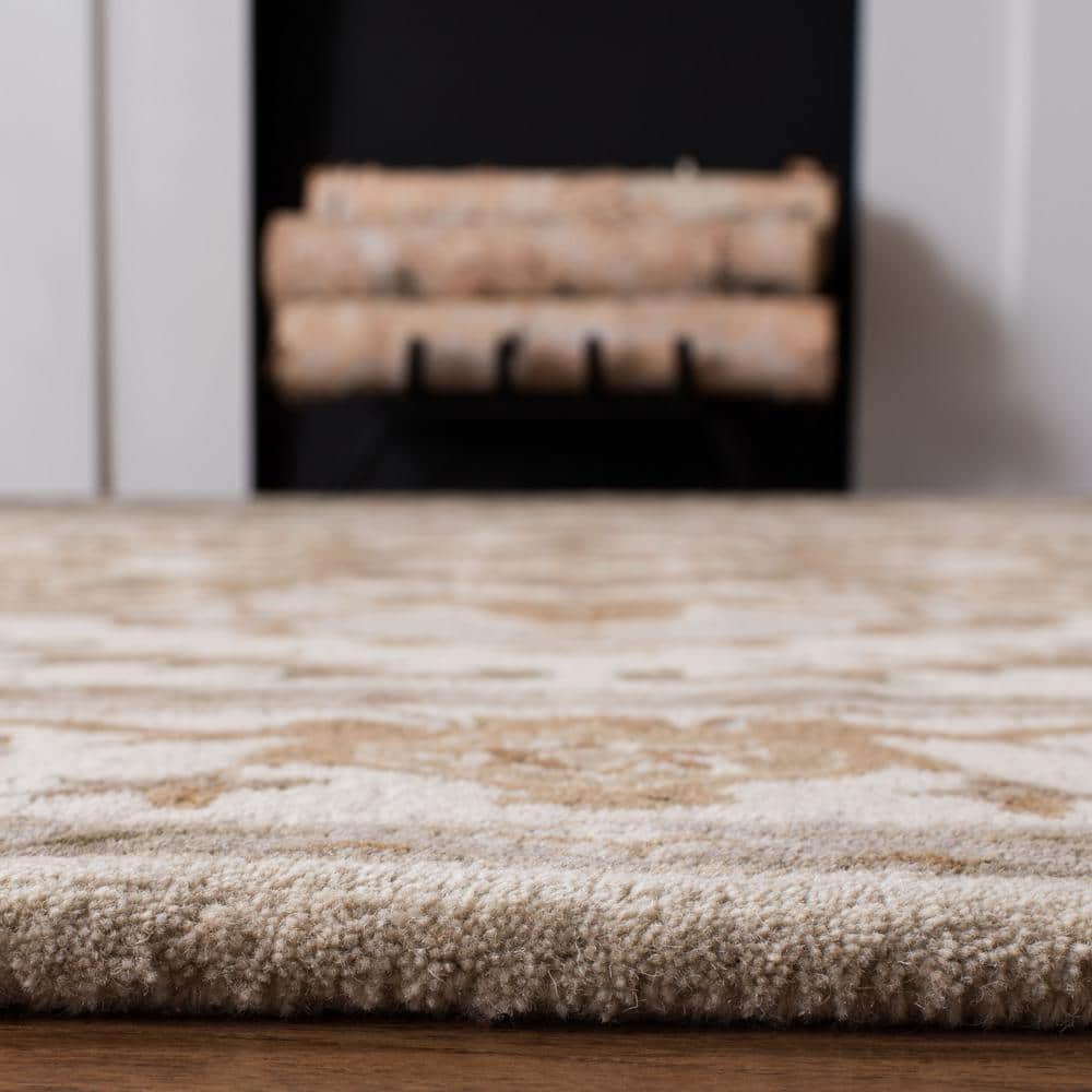 Handmade Beige and Sage Wool Tufted Round Rug