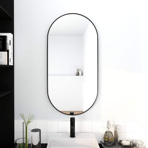 Unbranded 17.7 in. W x 35.4 in. H Oval Framed Wall Mount Bathroom Vanity Mirror in Black