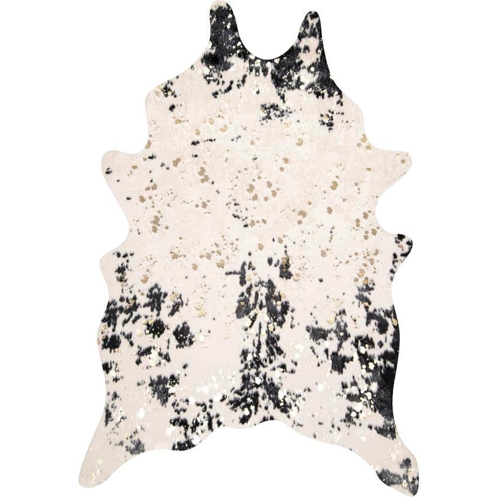 Black and Ivory Tufted Synthetic Cowhide Shaped Area Rug