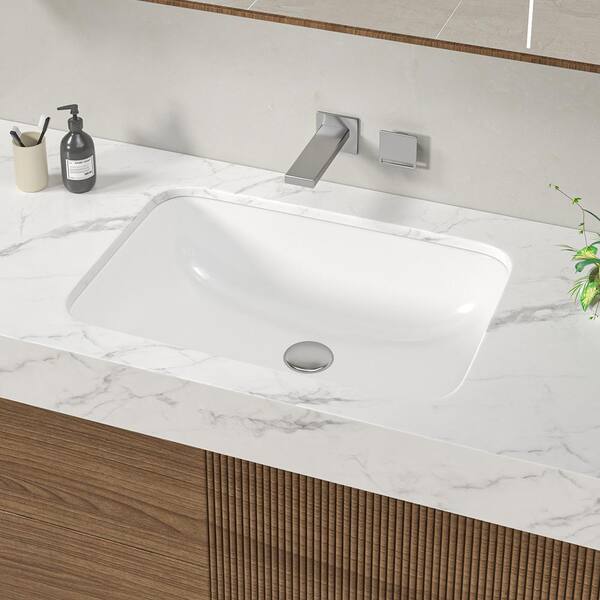 https://images.thdstatic.com/productImages/6929cb22-032e-4c90-96bf-d81342d4db67/svn/white-glacier-bay-undermount-bathroom-sinks-lvb1039-e1_600.jpg