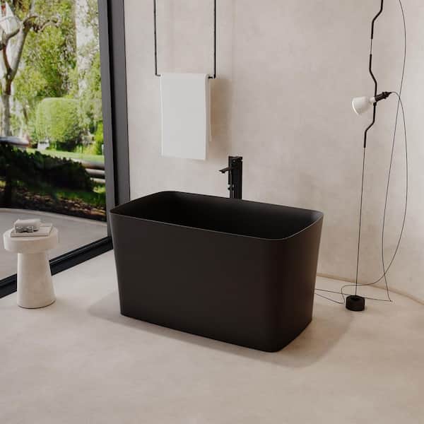 47 in. x 27.6 in. Freestanding Stone Resin Solid Surface Rectangular Soaking Bathtub in Matte Black with Seat