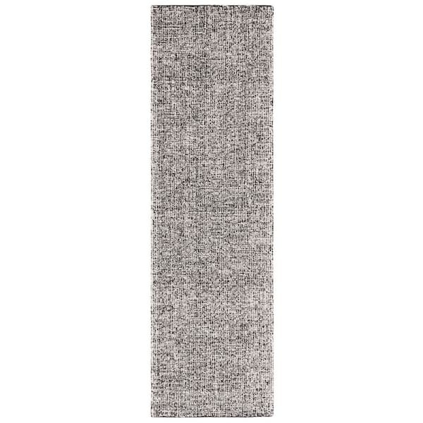 Ebony 2 ft. x 7 ft. Black/Ivory Abstract Noise Runner Rug