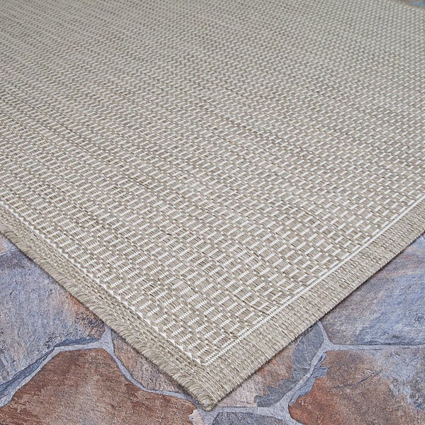 https://images.thdstatic.com/productImages/6940878a-8123-4549-8194-04225b2663f0/svn/champagne-taupe-couristan-outdoor-rugs-10012312020037t-c3_600.jpg