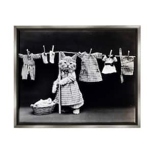 Kitten Does The Laundry by Daphne Polselli Floater Frame Animal Wall Art Print 31 in. x 25 in.