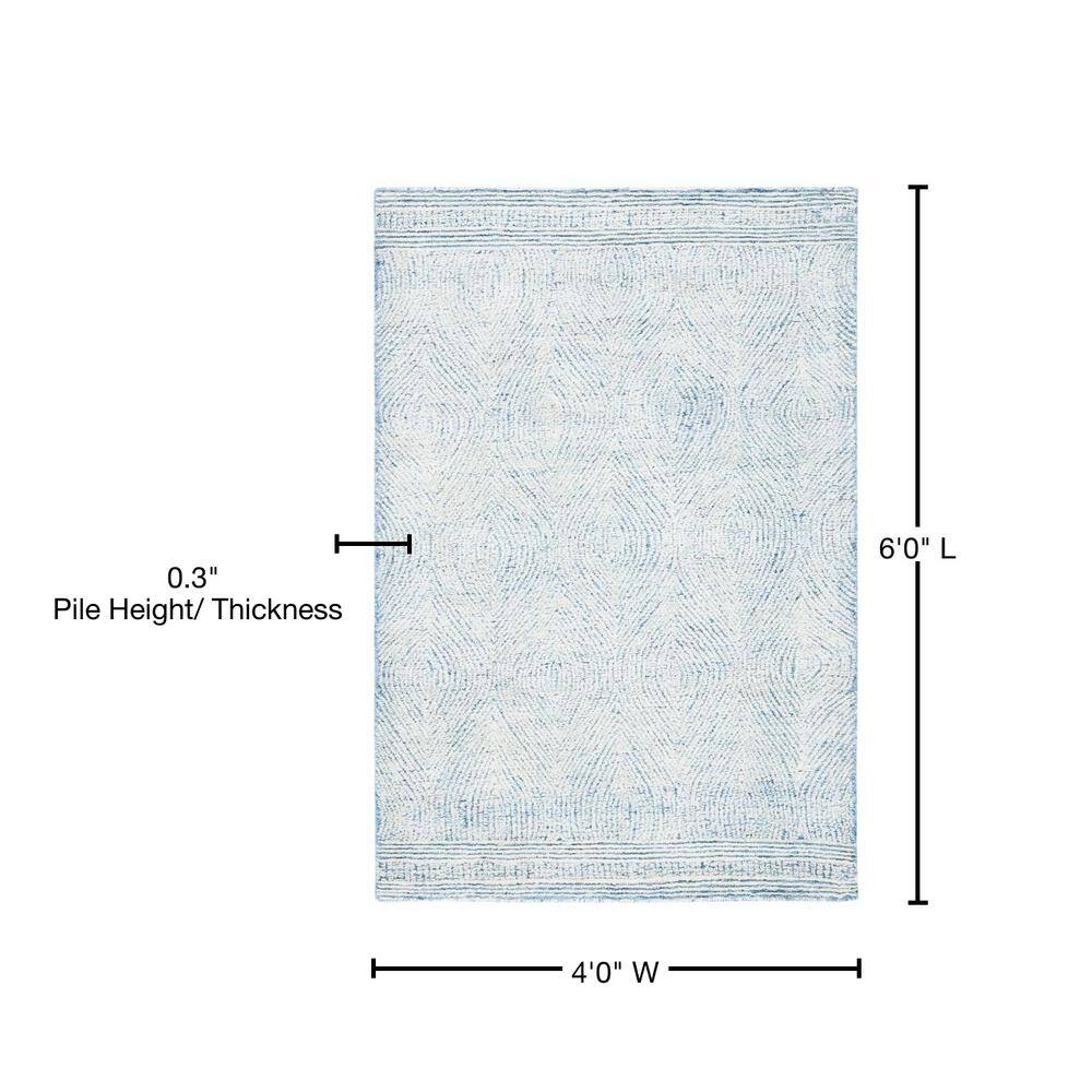 Ivory and Blue Abstract Handmade Tufted Wool Rug 4' x 6'
