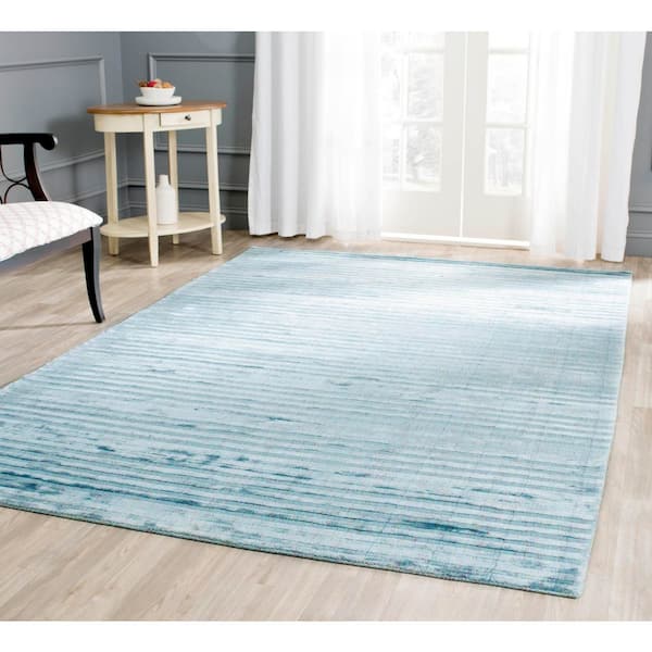 Mirage 6 ft. x 9 ft. Blue Striped Solid Color Area Rug