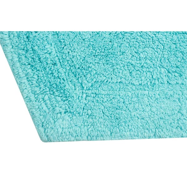 https://images.thdstatic.com/productImages/6980ecc3-c996-44a0-b1f9-ef62074e69e6/svn/turquoise-bathroom-rugs-bath-mats-bwa2020ctq-1f_600.jpg