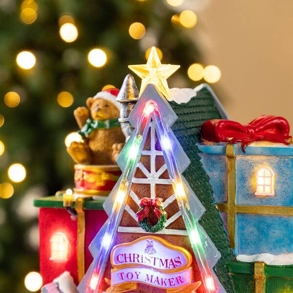 Glitzhome 10.75 in. Lighted Toy Market Resin Christmas Village