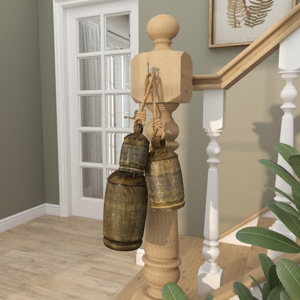 Litton Lane Gold Metal Tibetan Inspired Cylindrical Decorative Cow