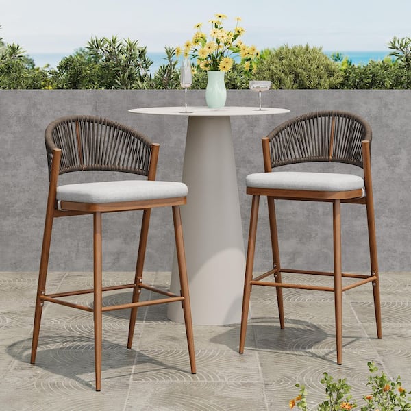 CHRISTOPHER KNIGHT HOME Chamberlain 30.25 in. Aluminum Patio Outdoor Bar Stool with Light Grey Cushion, Teak Finish, PE Rattan, Set of 2