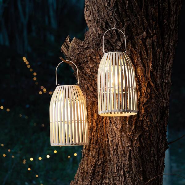 Glitzhome 9.75 in. H White Metal Stripes Solar Powered Edison Bulb Outdoor Hanging Lantern Set of 2 2023300063 The Home Depot