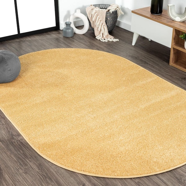 Haze Solid Low-Pile Mustard 4 ft. x 6 ft. Oval Area Rug