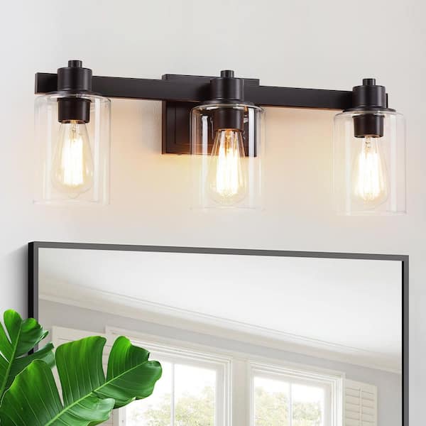 23 in. 3 Light Oil Rubbed Bronze Vanity Light with Clear Glass Shades