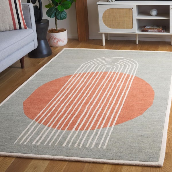 Rodeo Drive 8 ft. x 10 ft. Gray/Rust Abstract Striped Oval Area Rug