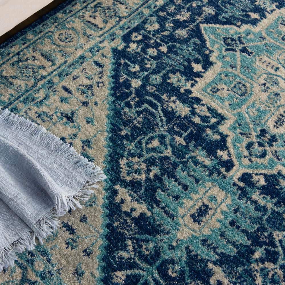 Ivory and Navy Synthetic 5' x 7' Rectangular Area Rug