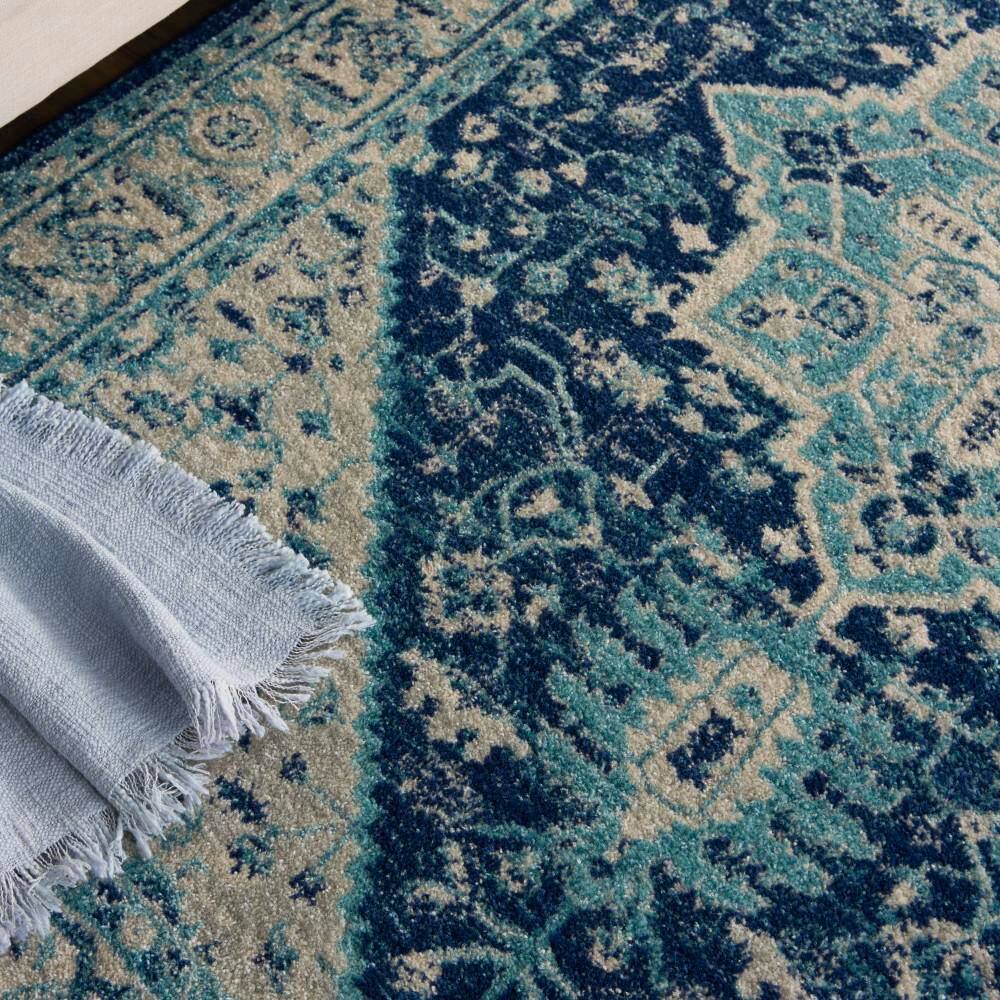 Ivory and Navy Synthetic 5' x 7' Rectangular Area Rug