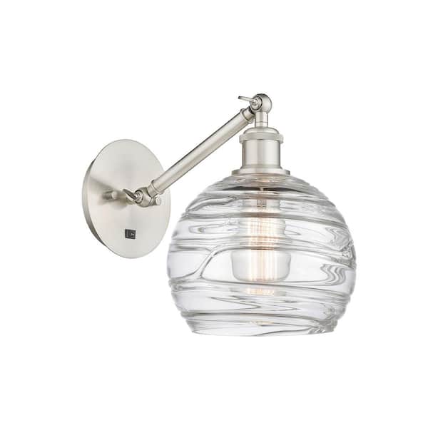 Athens Deco Swirl 1-Light Brushed Satin Nickel, Clear Deco Swirl Wall Sconce with Clear Glass Shade