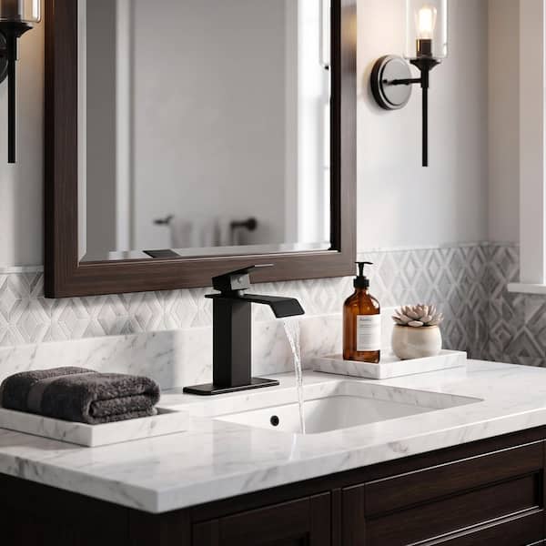 Waterfall Single Hole Single-Handle Low-Arc Bathroom Faucet with Pop Up Drain Assembly in Matte Black