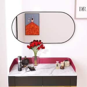 18 in. W x 35 in. H Oval Metal Framed Wall Bathroom Vanity Mirror in Matte Black