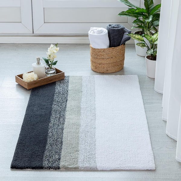 https://images.thdstatic.com/productImages/6a12b8f6-5f55-4d59-9f22-bcac6dccd162/svn/gray-mh-london-bathroom-rugs-bath-mats-mh-br-1042-e1_600.jpg