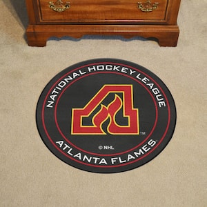 NHL Retro Atlanta Flames Black 2 ft. Round Hockey Puck Area Rug
