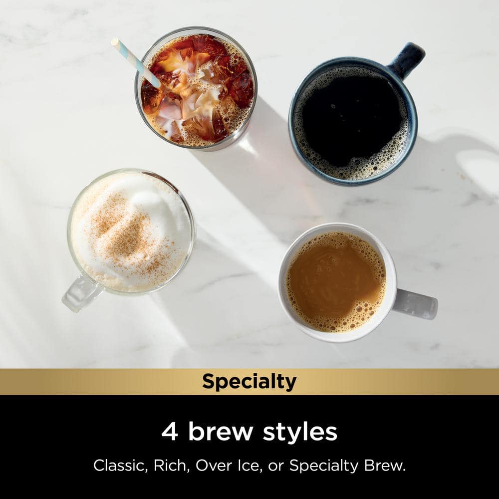 Black Single-Serve Coffee Maker with Integrated Milk Frother