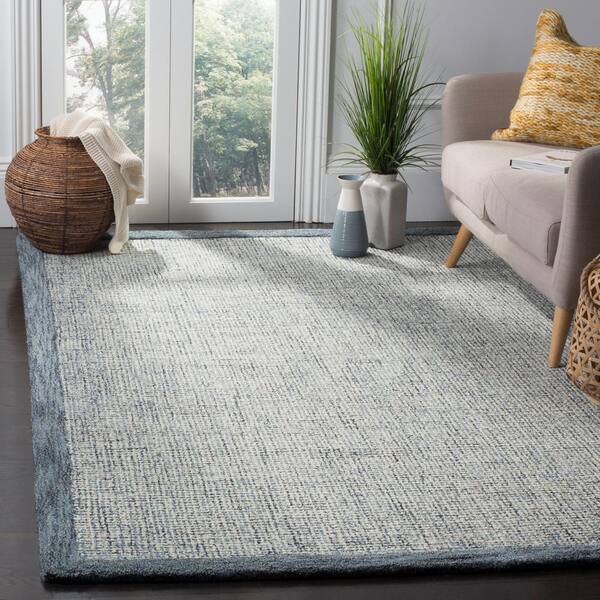 Abstract Navy/Ivory 8 ft. x 10 ft. Border Area Rug