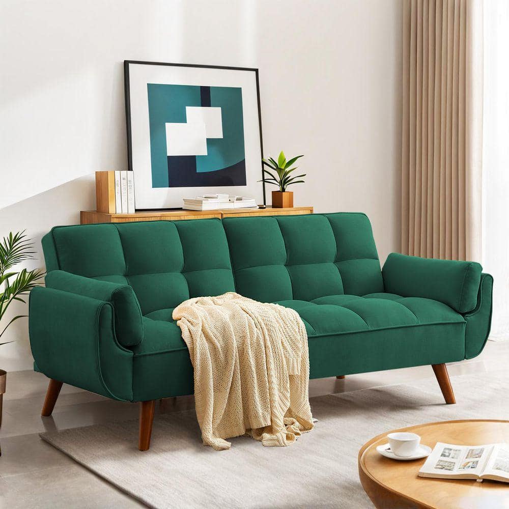 Elegant green twin size sofa bed futon convertible couch loveseat in a living room.