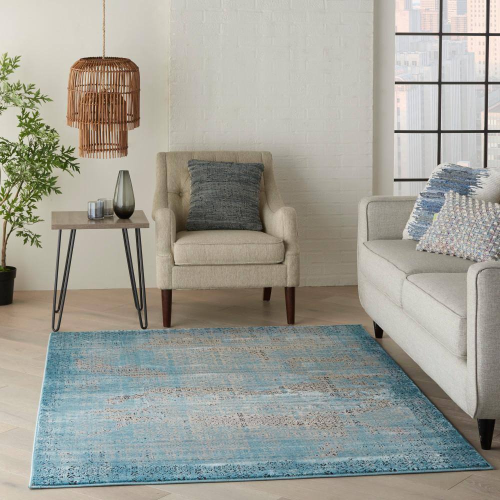 Blue 5' x 7' Stain-Resistant Synthetic Rectangular Area Rug