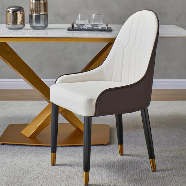 Cream leather dining chairs best sale with dark wood legs