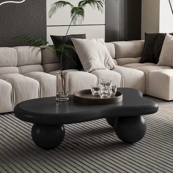 40 in. Black Oval Cloud Shaped MDF Coffee Table with 3 Ball Legs