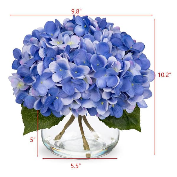 Blue Artificial Flowers Paired with a Glass Vase L0CZRQCB1W - The