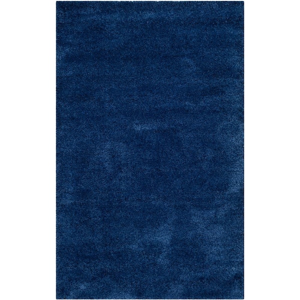 Milan Shag Navy 5 ft. x 8 ft. Solid Flokati Area Rug