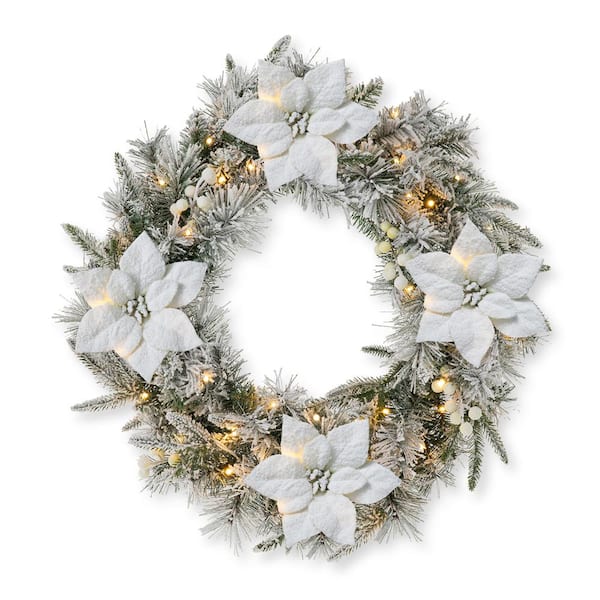 Glitzhome 24 in. D Pre-Lit Snow Flocked Greenery Pine Poinsettia Artificial Christmas Wreath, with 50 White Lights with Timer
