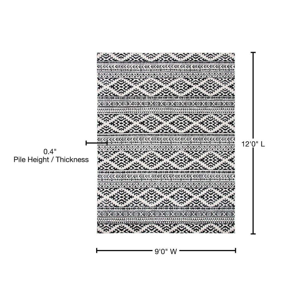 Ivory and Black Geometric Synthetic 9' x 12' Area Rug